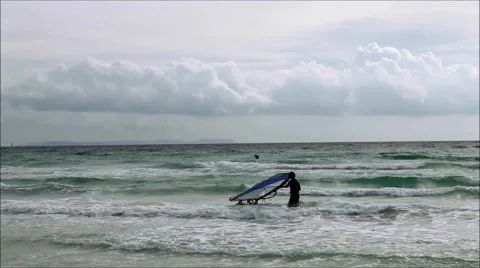Surfer with board in water I Stock Footage 41705002