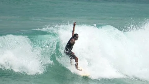 Surfer on a board on the waves, slow motion video, surfer in slow motion Stock-Footage 275327243