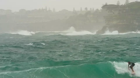 A surfer with Bronte background in Sydney 4K Stock Footage 156486790