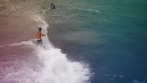Surfer catch some waves Stock Footage