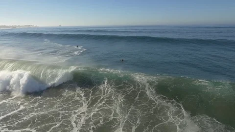 Surfer catches head high wave Stock Footage 77610346
