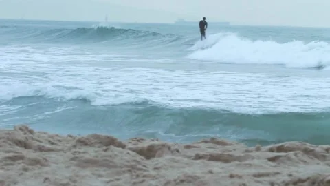 Surfer Catches Rolling Waves CA Stock-Footage 211779521