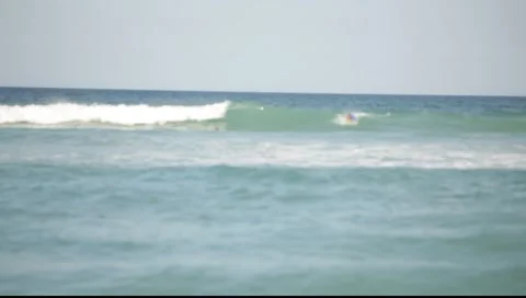 Surfer Catches Wave 스톡 동영상 6921810