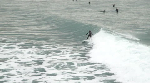 Surfer Catches Wave Stock Footage 46796621
