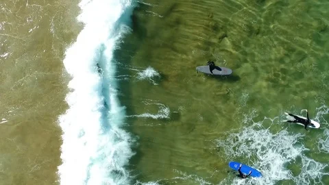 Surfer catching and being dumped by wave Stock Footage 99754524