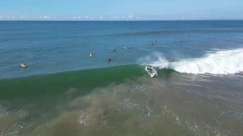 Surfer catching nice tropical wave Stock Footage 274932066