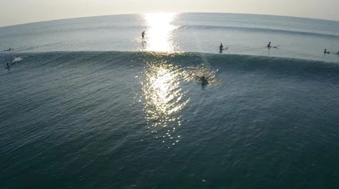 Surfer Catching a wave from above Stock Footage 58418267