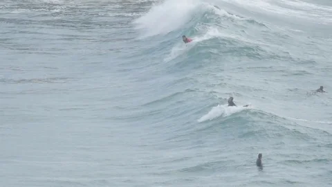 Surfer catching wave in beach Stock Footage 75652428