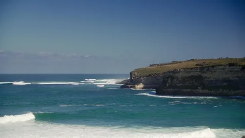 Surfer catching wave on coastline, Great Ocean Road Video stock 89950329