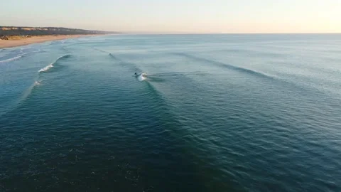Surfer catching Waves in Costa da Caparica beach, Portugal Video stock 146101821