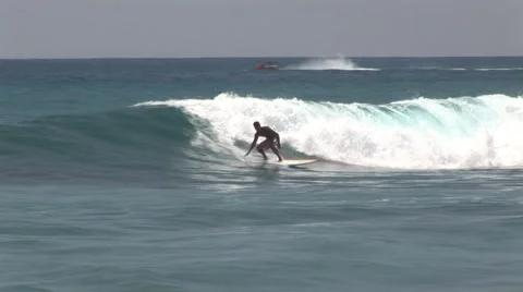 Surfer Catching Waves , Ocean Liner in Background Stock Footage 5241883