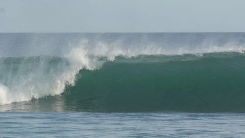 Surfer caught in a big wave close out Stock Footage 84897842