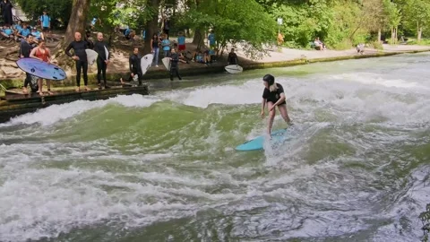 Surfer in the city river called Eisbach at Munich, Germany Stock Footage 281319270