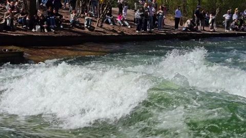Surfer in the city river called Eisbach at Munich, Germany Stock Footage 307314973