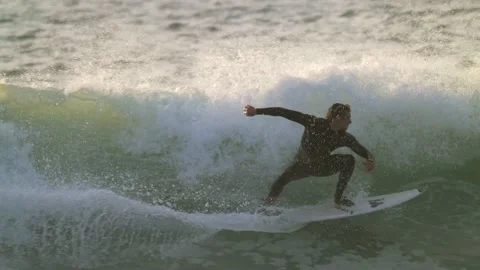Surfer closeup riding waves crashes forward Stock Footage 146822808
