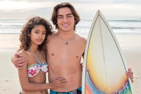Surfer couple Stock Photos