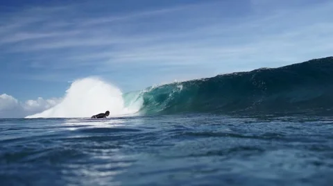 Surfer diving in wave Stock Footage 68104975