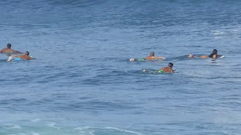 A surfer does a top turn Stock Footage 76147154