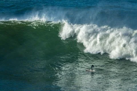 Surfer duck diving in a wave, Stock Photos