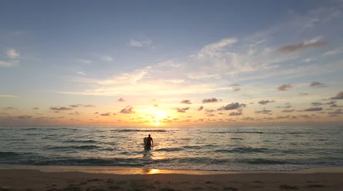 Surfer exits Ocean Stock Footage 41793181
