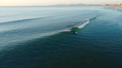 Surfer failed takeoff in Costa da Caparica beach, Portugal Stock Footage 146101812