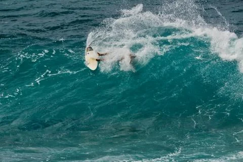 Surfer falling in to wave Stock Photos