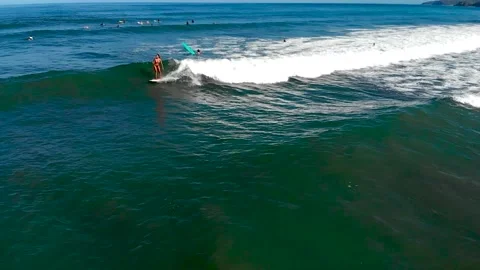 Surfer falling when taking a wave Stock Footage 141974577