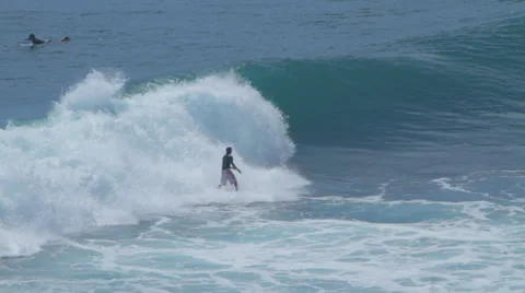 SURFER FALLS IN WAVE Stock Footage 27333208