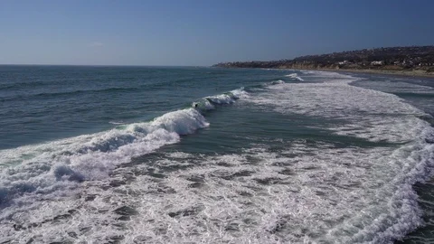 Surfer Falls While Catching a Wave in the Pacific Ocean Stock Footage 96039981
