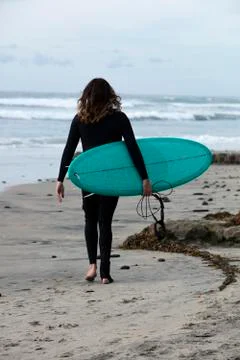 Surfer Getting Ready To Ride The Waves Stock Photos