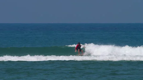 Surfer glides on the wave Stock Footage 167299269