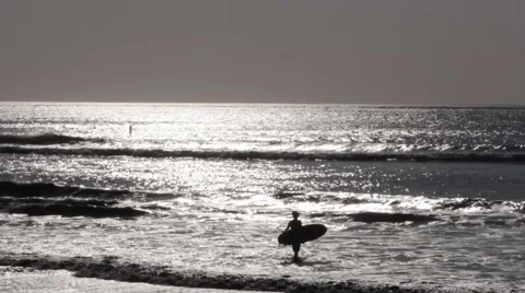 Surfer Going Into the Ocean With Surf Stock Footage 67530916