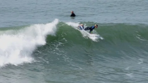 Surfer Grom Catching Wave | Oceanside, CA Stock Footage 75729797