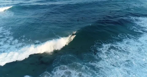 Surfer on lefthander wave Stock Footage 96131934