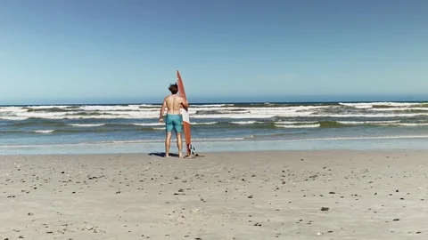 Surfer looking out at the waves Video stock 76521570