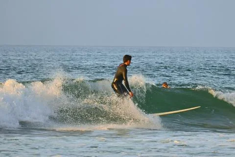 Surfer man in dynamic action off Ferrol, Spain (5) , 12/06/2025 Stock Photos