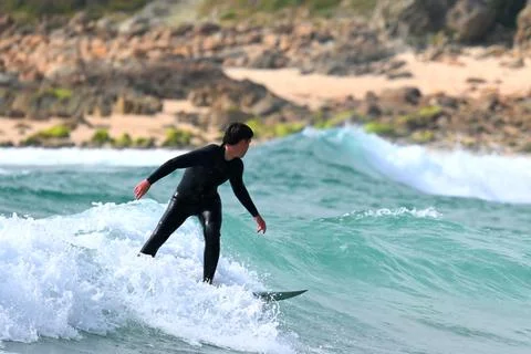 Surfer man in dynamic action off Ferrol, Spain (2) , 12/06/2025 Stock Photos