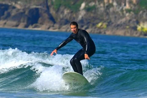 Surfer man in dynamic action off Ferrol, Spain (7), 15/06/2025 Stock Photos
