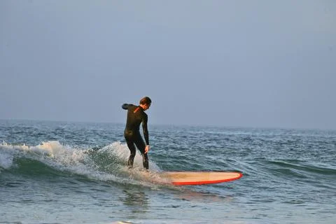 Surfer man in dynamic action off Ferrol, Spain (6), 15/06/2025 Stock Photos
