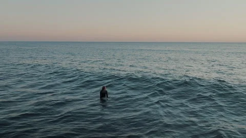Surfer man floating in the calm sea. Stock Footage 285729076