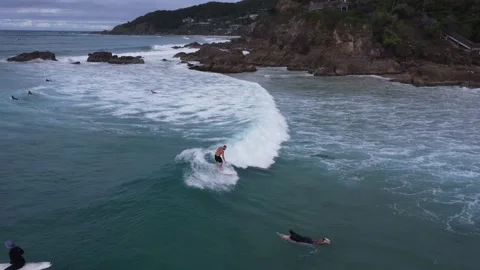 Surfer Meandering His Way Through A Crowded Ocean - Byron Bay Stock Footage 239576742