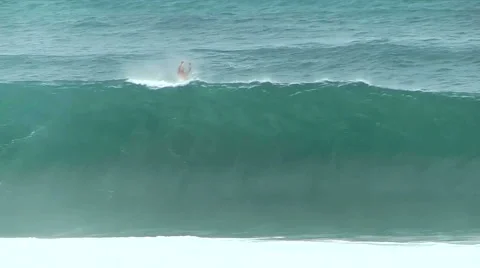 Surfer Misses Pipeline Wave Stock Footage 1044444
