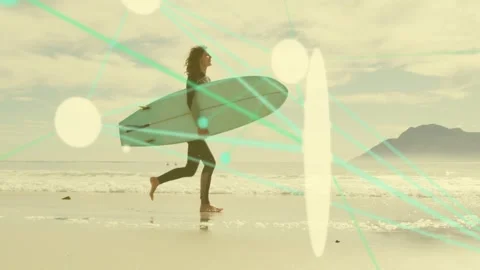 Surfer nearing surf, quickening avoiding wash while hugging board, teal lines Stock Footage 332981668