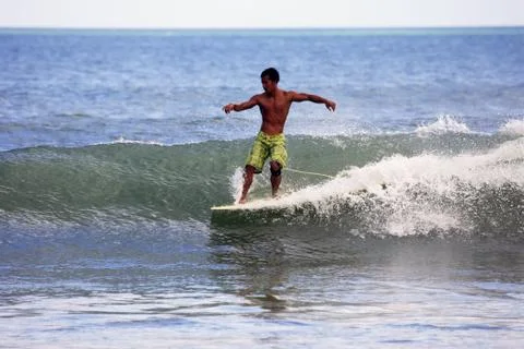 Surfer in ocean Stock Photos
