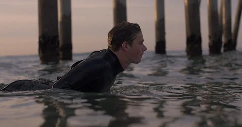 Surfer Paddles Out Video stock 262098223