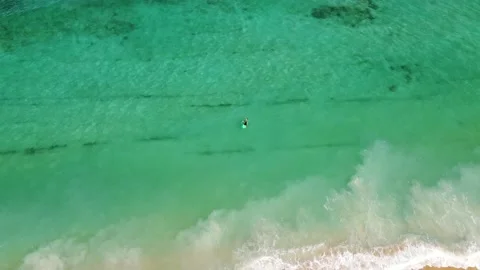 Surfer paddling  動画素材 145249162