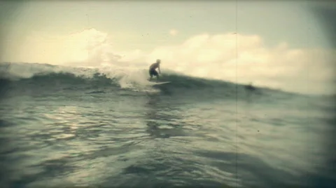 Surfer passing vintage Stock-Footage 870198