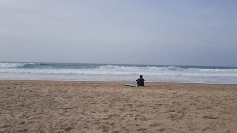 Surfer Resting From Exercise Stock Footage 103203239