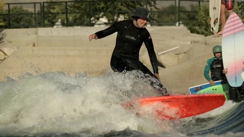 Surfer Rides Crazy River Wave Stock Footage 100034222
