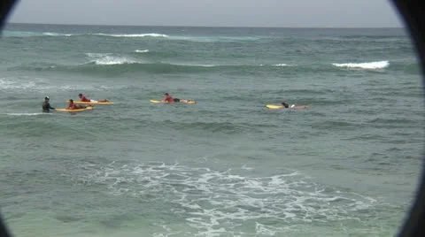 Surfer Rides to Shore During Surf Lessons 動画素材 25853377